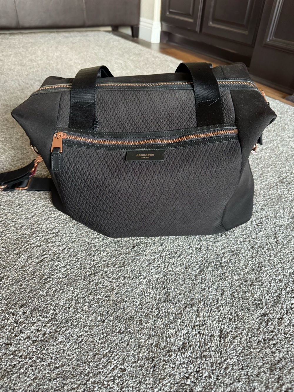 Storksak Black Quilted Baby Duffel with Rose Gold Zippers